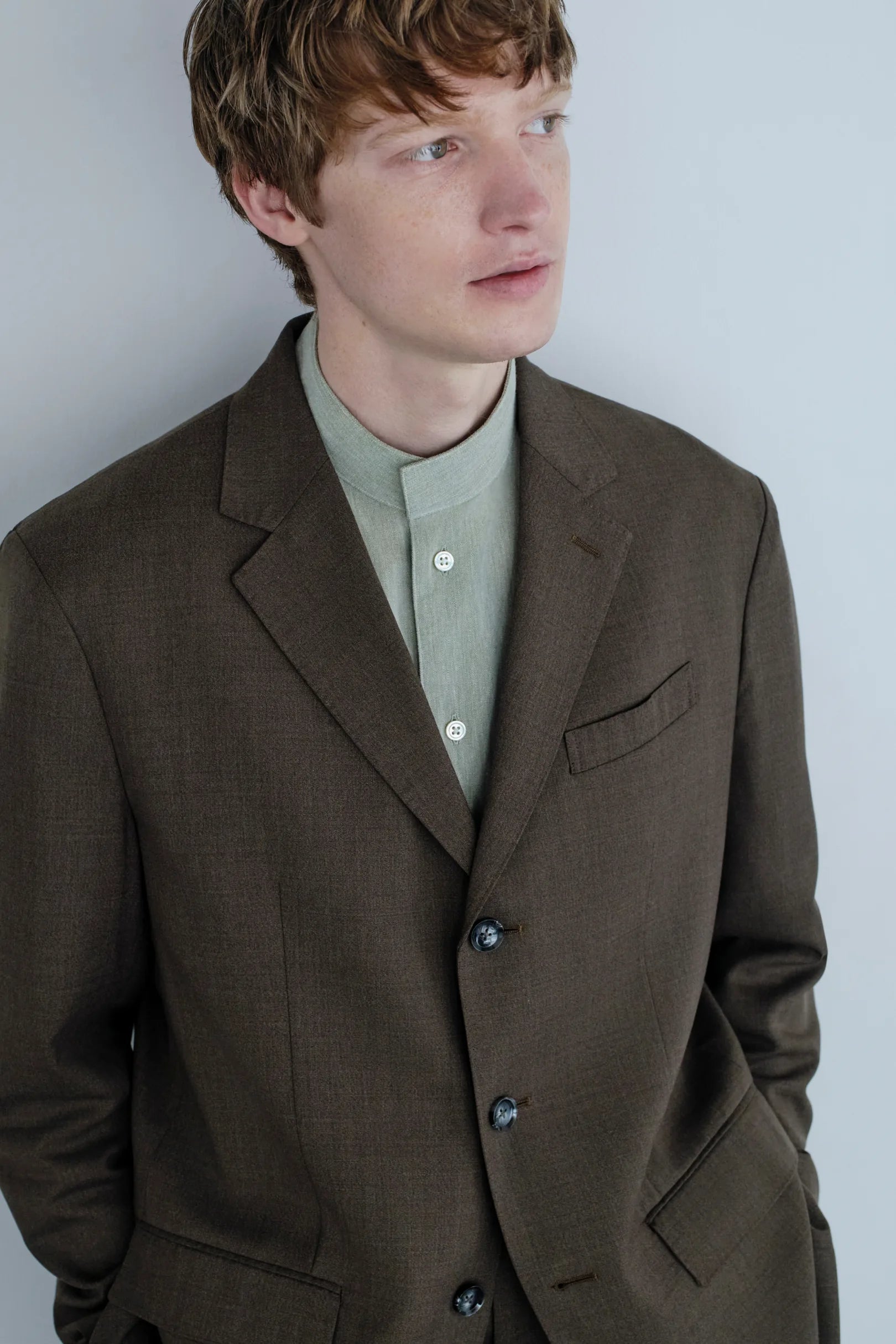 Model in beige overcoat